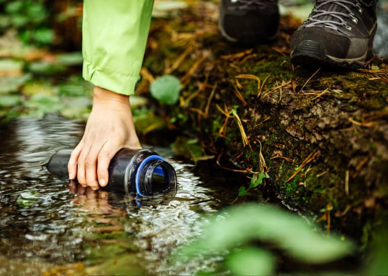 How Much Water to Take Backpacking? Hikers Hydration Guide