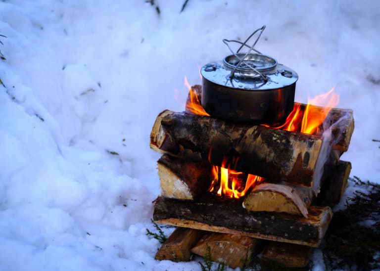 How to Build the Best Winter Campfire (and Cook Like a Boss)